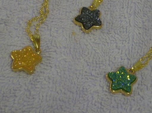 Druzy aura star pendants, gold plated.